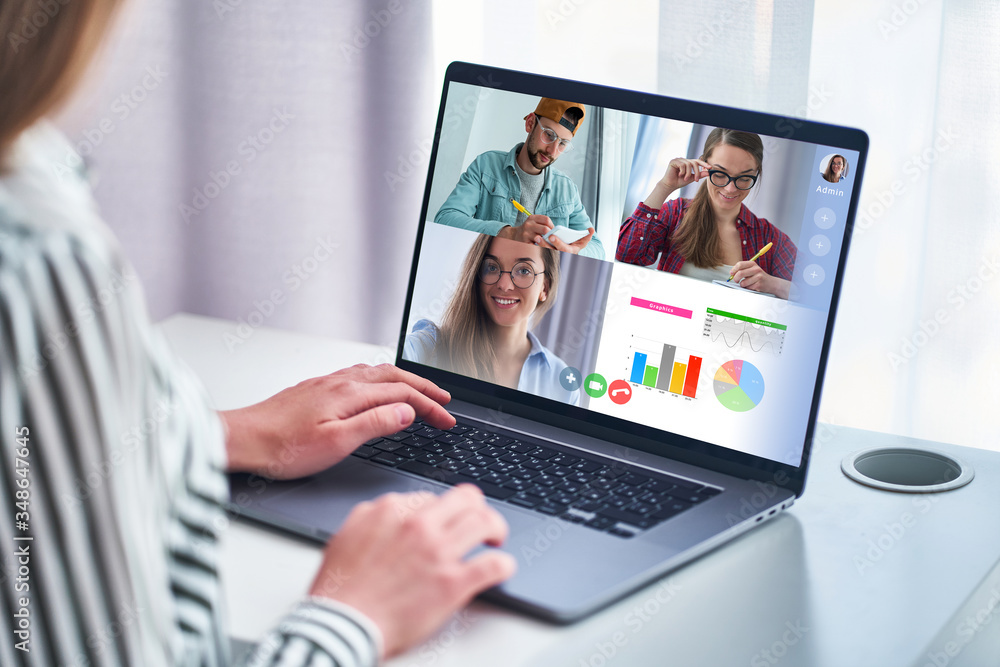 Online seminar: a laptop with a video conference and a chart